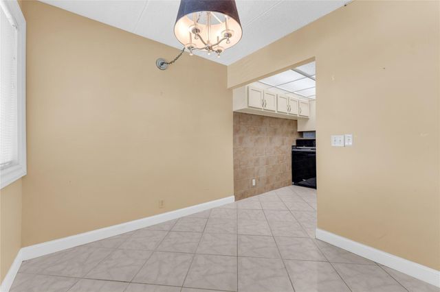 300 Village Green Circle 210, Palm Springs, FL 33461