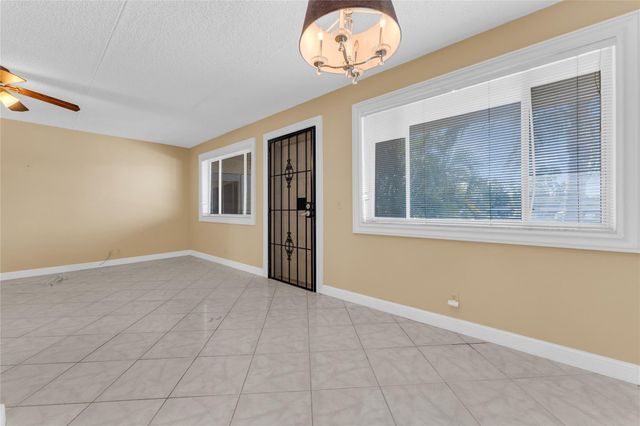 300 Village Green Circle 210, Palm Springs, FL 33461