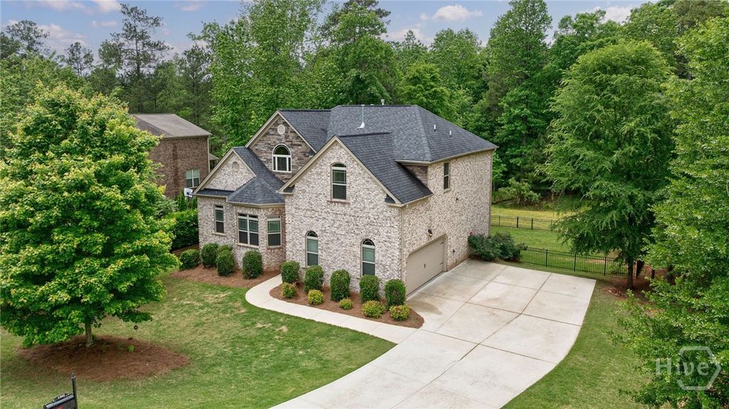 Image 1 of property listing at 1301 Riverhill Drive, Bishop, GA 30621