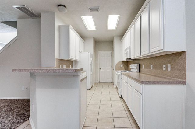 87 N Burberry Park Circle, The Woodlands, TX 77382