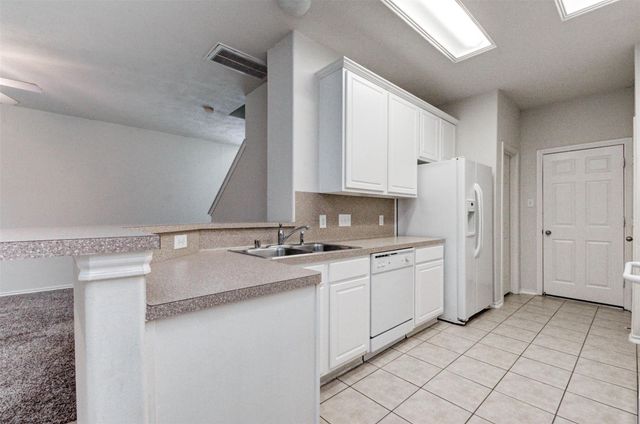 87 N Burberry Park Circle, The Woodlands, TX 77382