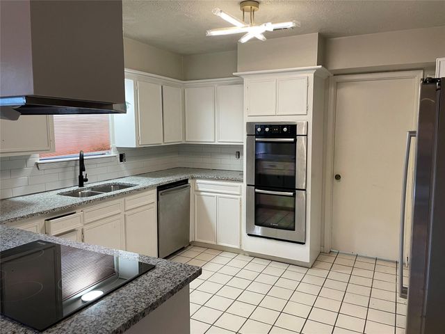 5715 Pinewood Springs Drive, Houston, TX 77066