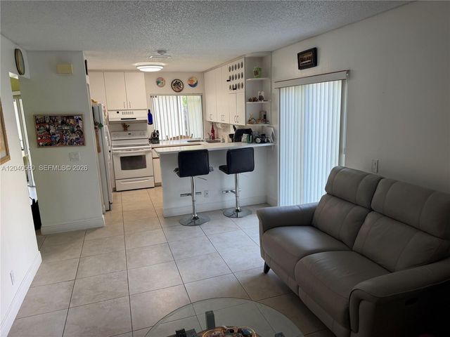 1335 Seagrape Cir, Weston, FL 33326