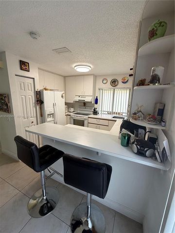 1335 Seagrape Cir, Weston, FL 33326