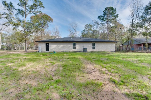 10622 Rustling Oaks Drive, Conroe, TX 77303