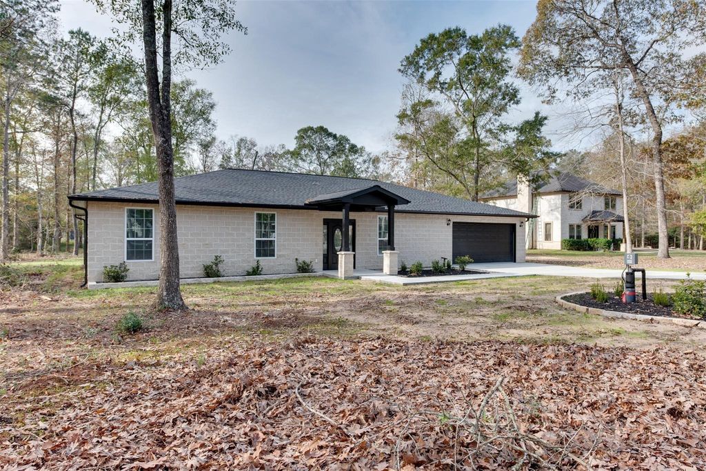 10622 Rustling Oaks Drive, Conroe, TX 77303