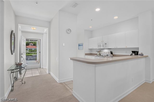 975 Tarpon Cove DR 103, Naples, FL 34110