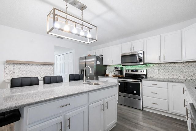 1033 TAWNY EAGLE DRIVE, Groveland, FL 34736