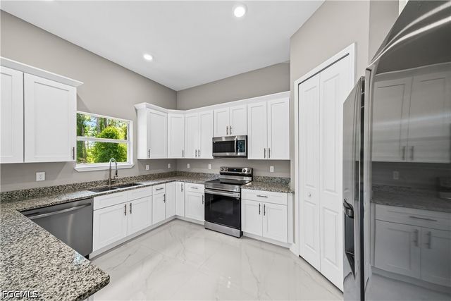 1032 Milwaukee BLVD, Lehigh Acres, FL 33974