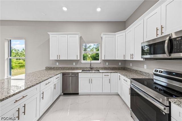 1032 Milwaukee BLVD, Lehigh Acres, FL 33974