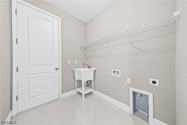 1032 Milwaukee BLVD, Lehigh Acres, FL 33974