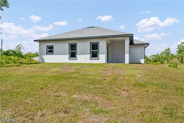 1032 Milwaukee BLVD, Lehigh Acres, FL 33974