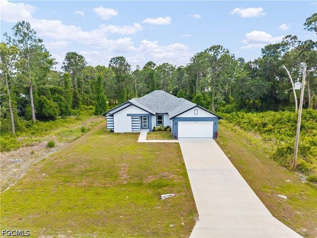 1032 Milwaukee BLVD, Lehigh Acres, FL 33974