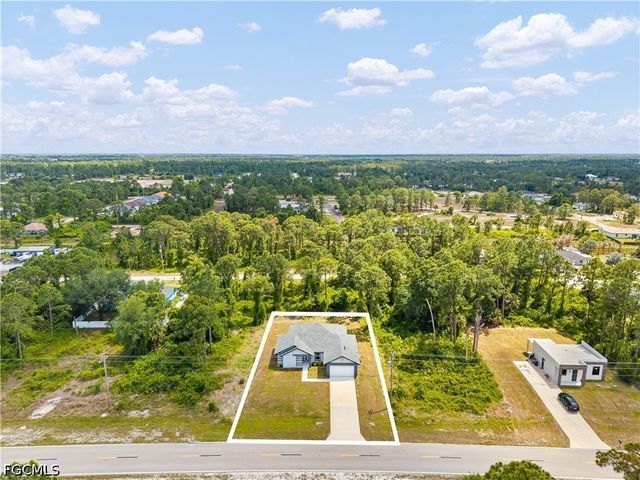 1032 Milwaukee BLVD, Lehigh Acres, FL 33974