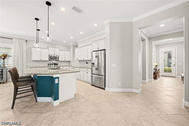 4115 Raffia DR, Naples, FL 34119