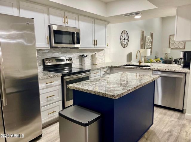9040 E WINCHCOMB Drive, Scottsdale, AZ 85260
