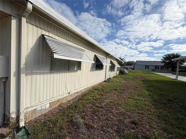 930 TARRSON BOULEVARD, Lady Lake, FL 32159