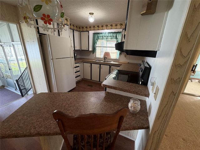 930 TARRSON BOULEVARD, Lady Lake, FL 32159