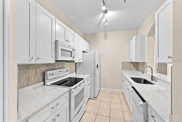 7135 YACHT BASIN AVENUE 211, Orlando, FL 32835