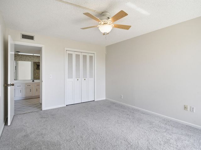5390 WOODLAND LAKES Drive 104, Palm Beach Gardens, FL 33418