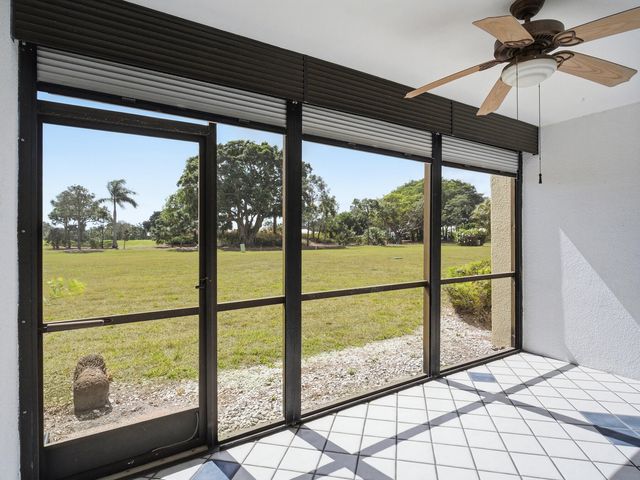 5390 WOODLAND LAKES Drive 104, Palm Beach Gardens, FL 33418