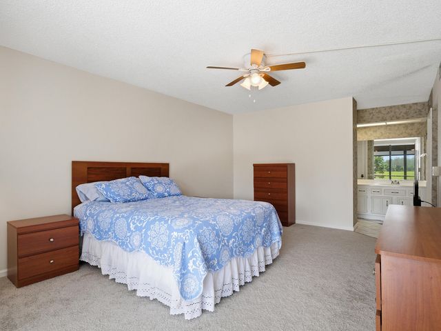 5390 WOODLAND LAKES Drive 104, Palm Beach Gardens, FL 33418