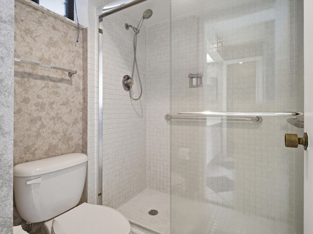 5390 WOODLAND LAKES Drive 104, Palm Beach Gardens, FL 33418