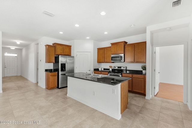 704 Remington Green Drive SE, Palm Bay, FL 32909