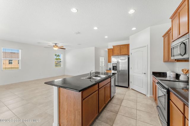 704 Remington Green Drive SE, Palm Bay, FL 32909