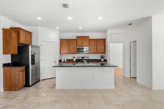 704 Remington Green Drive SE, Palm Bay, FL 32909