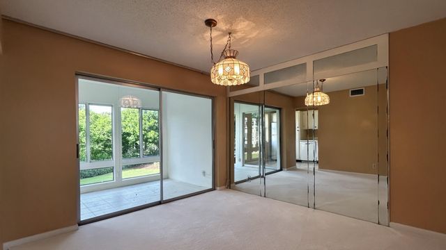 21 Colonial Club Drive 202, Boynton Beach, FL 33435