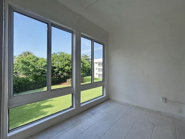 21 Colonial Club Drive 202, Boynton Beach, FL 33435