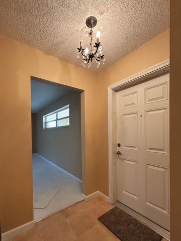 21 Colonial Club Drive 202, Boynton Beach, FL 33435