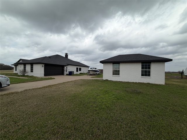 154 Whispering Winds Drive, Gunter, TX 75058