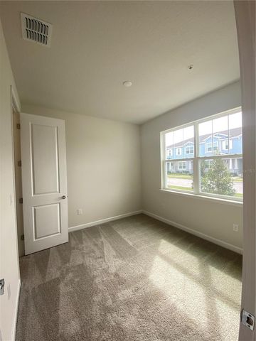 9005 VIA DI CANTI UNIT A DRIVE, Windermere, FL 34786