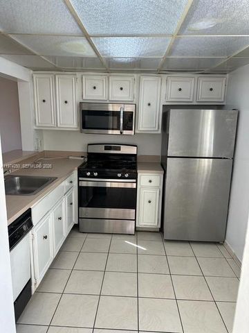 18051 NW 68th Ave J104, Hialeah, FL 33015