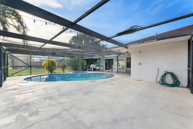 154 SANTA MONICA Avenue, Royal Palm Beach, FL 33411