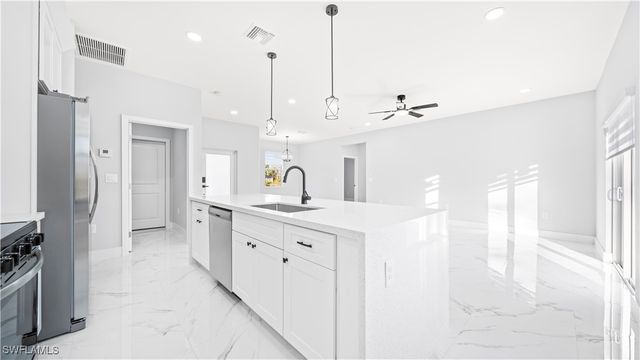 311 Mangonia AVE, Lehigh Acres, FL 33974