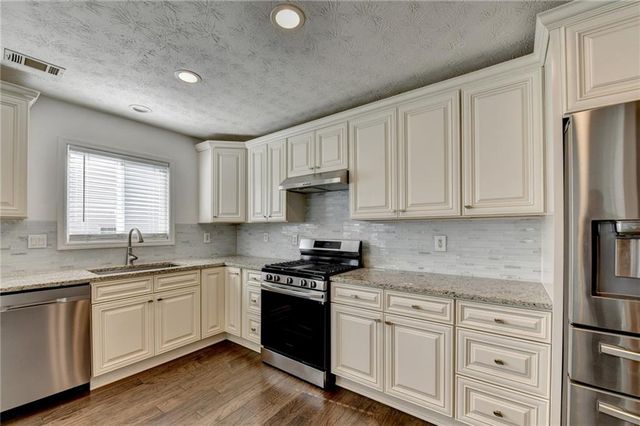 446 Canterbury Place Drive, Suwanee, GA 30024