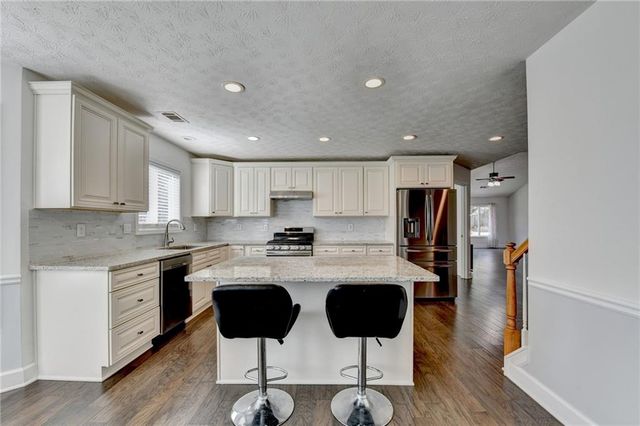 446 Canterbury Place Drive, Suwanee, GA 30024