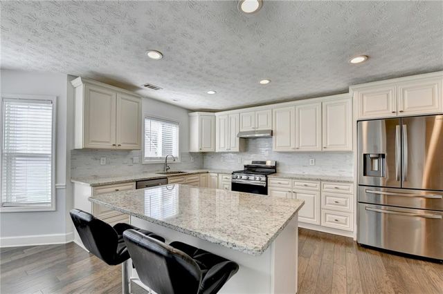 446 Canterbury Place Drive, Suwanee, GA 30024