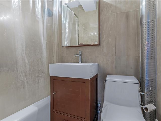 9905 63rd Dr Apt 7R, New York City, NY 11374