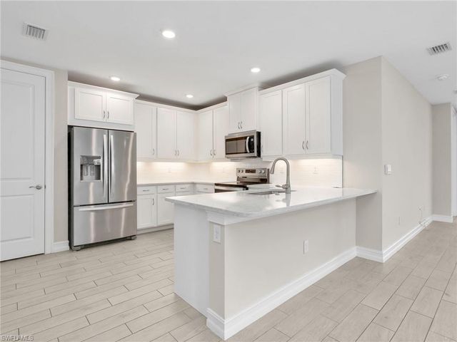 21904 Milan Villas LN, Estero, FL 33928