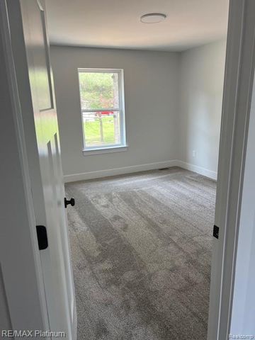 9400 Roland Drive, Hamburg Township, MI 48116