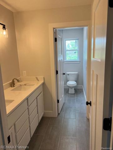 9400 Roland Drive, Hamburg Township, MI 48116