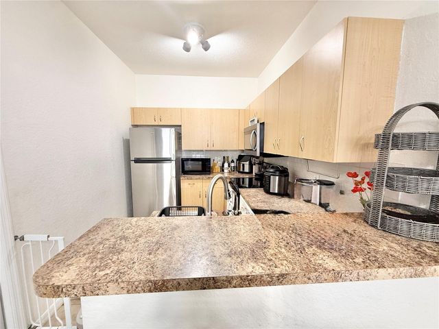22102 INDIAN CREEK DRIVE 1, Kissimmee, FL 34759