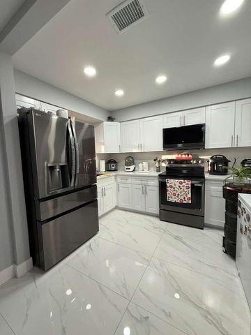 2403 Seaside Drive, Greenacres, FL 33463