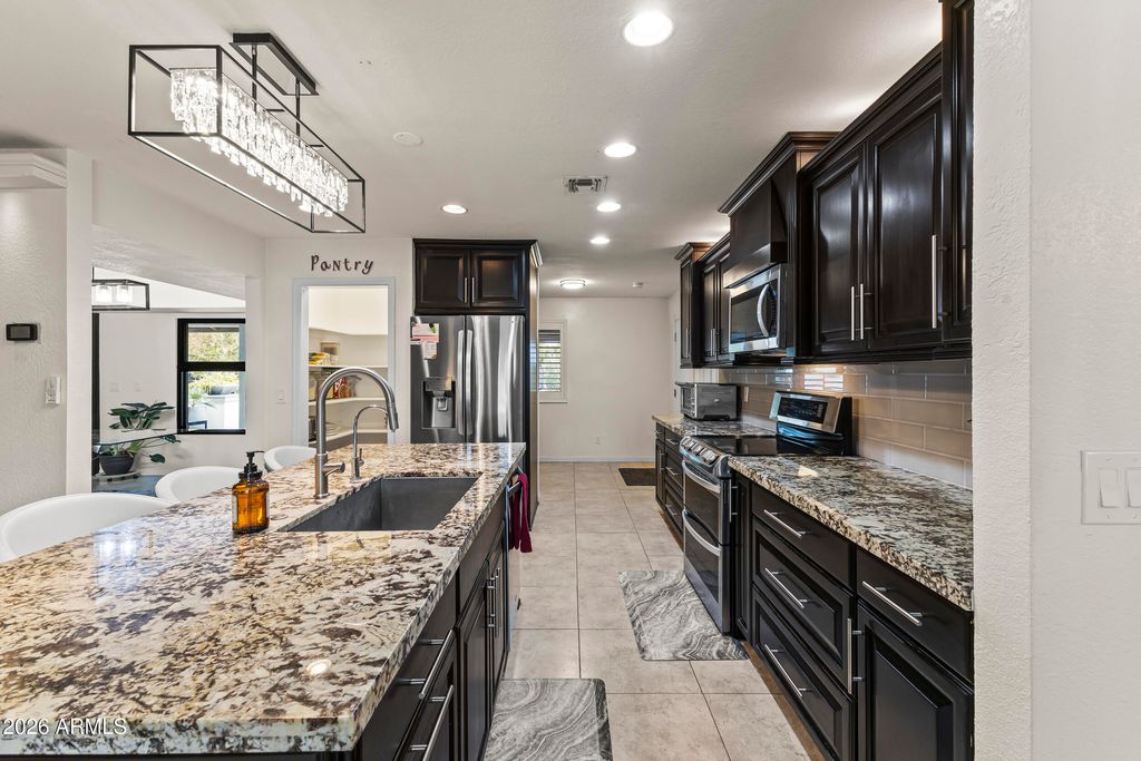 Image 16 of property listing at 1859 W NAVARRO Avenue, Mesa, AZ 85202