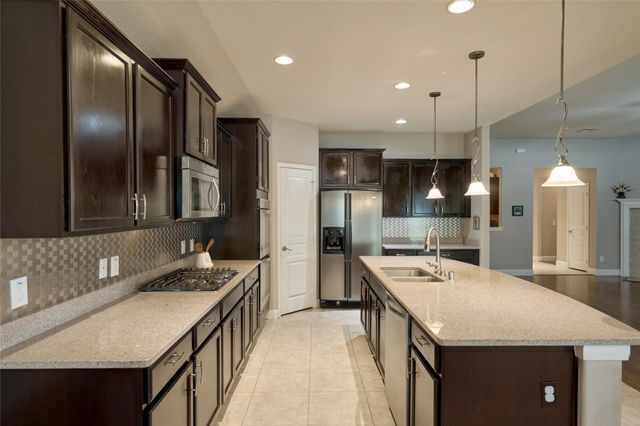 24511 Emerald Pool Falls Drive, Tomball, TX 77375