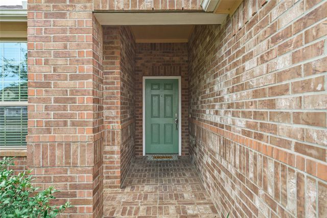 24511 Emerald Pool Falls Drive, Tomball, TX 77375
